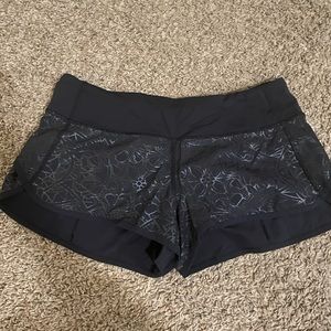 Lululemon black shorts w/ pattern detailing